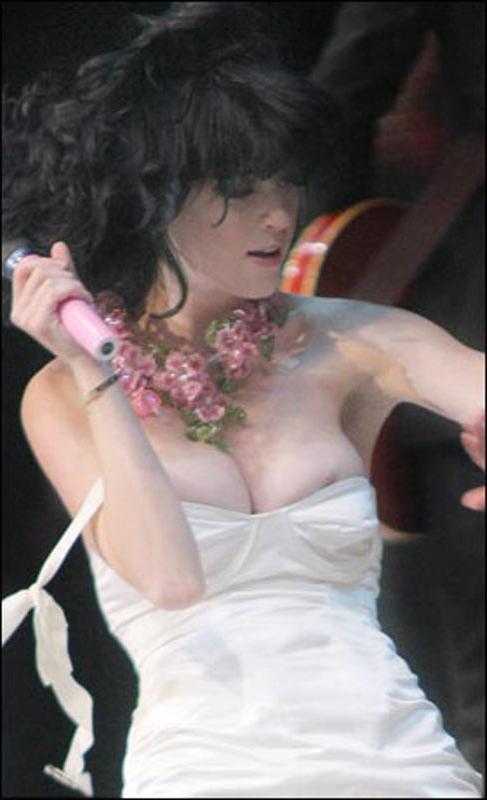 15P Katy Perry boob slipping out while performing