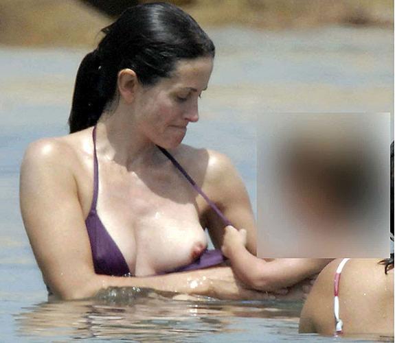 10P Courteney Cox posing in lingerie and tits slip paparazzi pictures