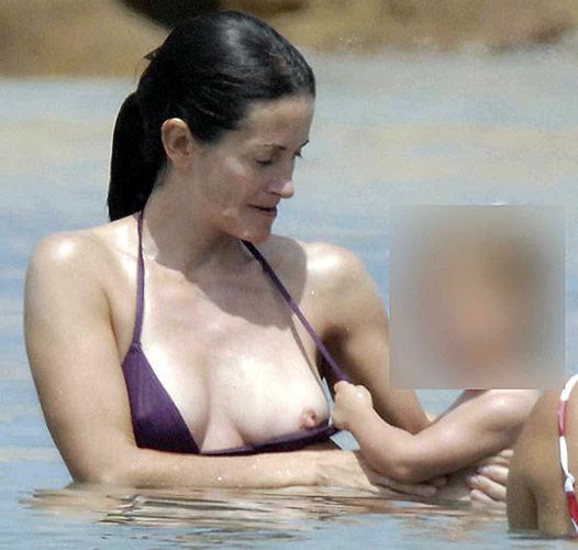 10P Courteney Cox posing in lingerie and tits slip paparazzi pictures
