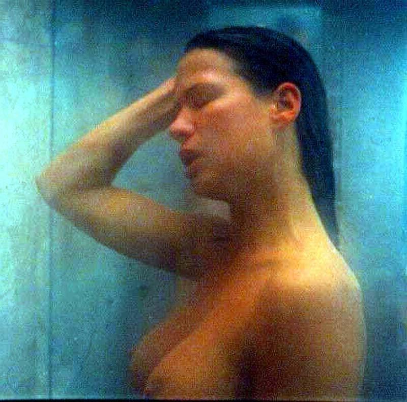 15P Rhona Mitra nude boobs nice cleavage in dress
