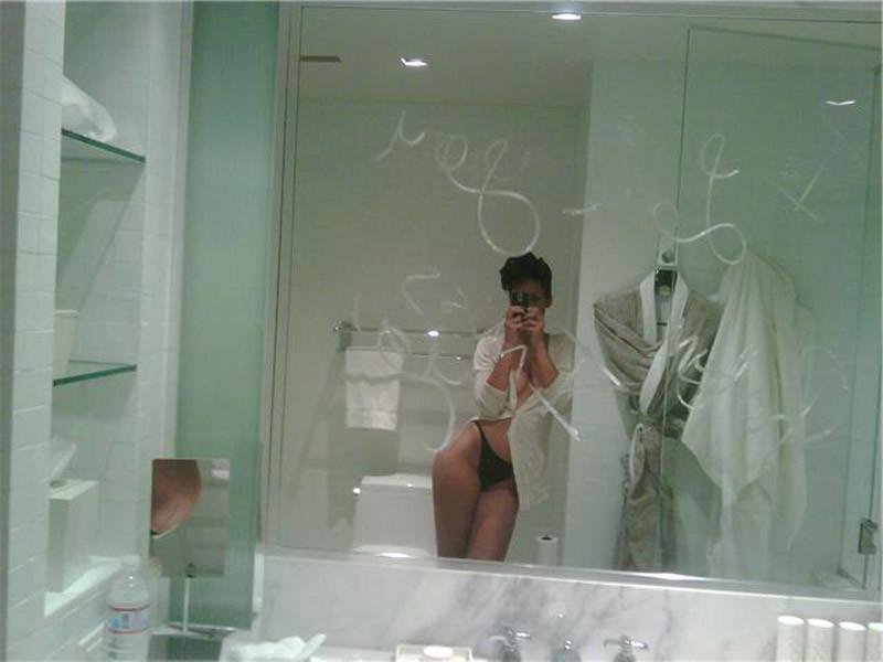 15P Rihanna showing nice cleavage in sexy blue dress