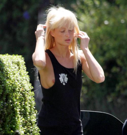 10P Paris Hilton tits slip and showing her nice pussy upskirt paparazzi pictures