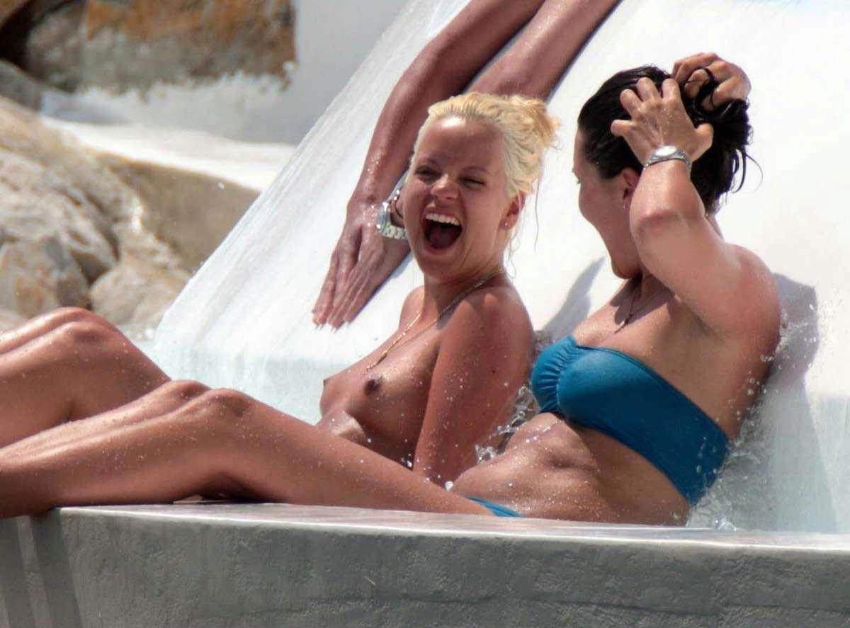 15P Lily Allen exposed topless on the beach
