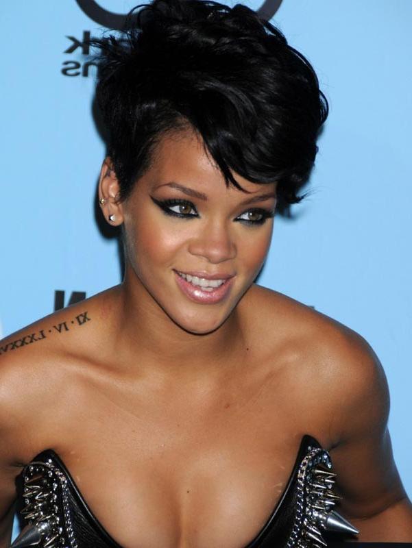 15P Rihanna wearing slutty fishnet stockings in public