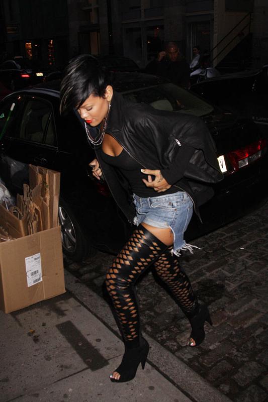15P Rihanna wearing slutty fishnet stockings in public