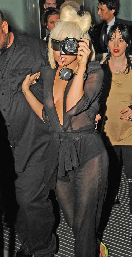 16P Lady Gaga showing her nice tits in see thru dress and upskirt paparazzi pictures