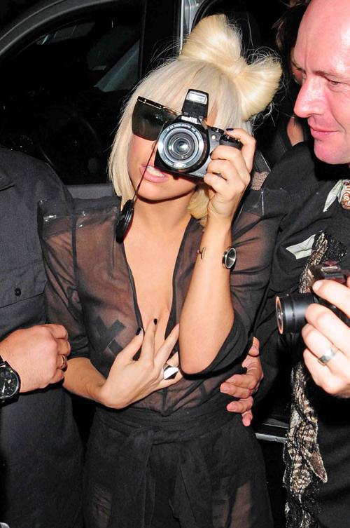 16P Lady Gaga showing her nice tits in see thru dress and upskirt paparazzi pictures