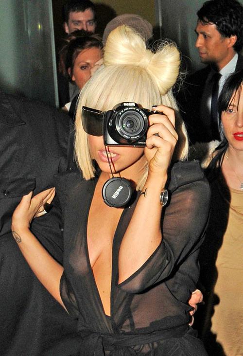 16P Lady Gaga showing her nice tits in see thru dress and upskirt paparazzi pictures
