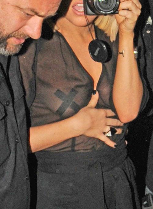 16P Lady Gaga showing her nice tits in see thru dress and upskirt paparazzi pictures