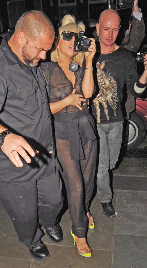 16P Lady Gaga showing her nice tits in see thru dress and upskirt paparazzi pictures