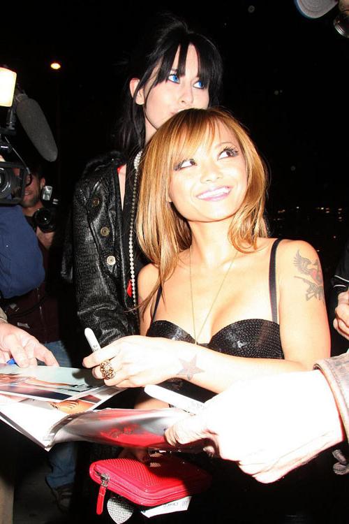 16P Tila Tequila show big cleavage and great legs in mini skirt paparazzi pictures a