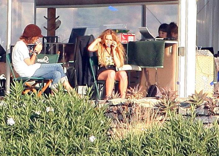 16P Lindsay Lohan showing her big tits and nipple slip
