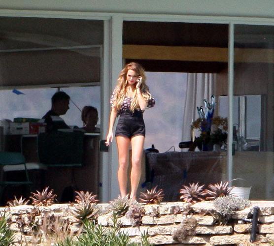 16P Lindsay Lohan showing her big tits and nipple slip