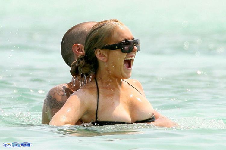16P Lindsay Lohan show tits in seethru and nipple slip