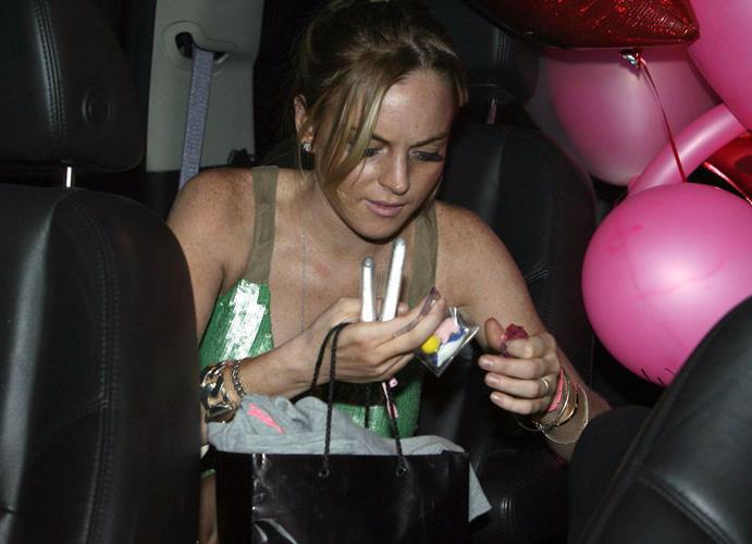 16P Lindsay Lohan show tits in seethru and nipple slip
