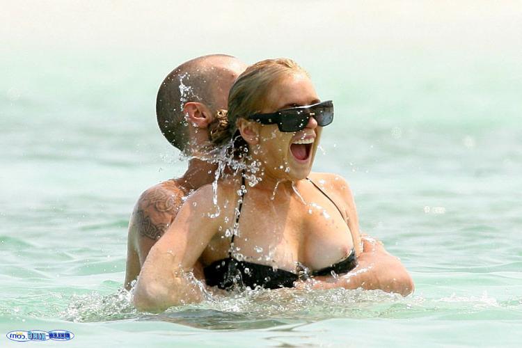 16P Lindsay Lohan show tits in seethru and nipple slip
