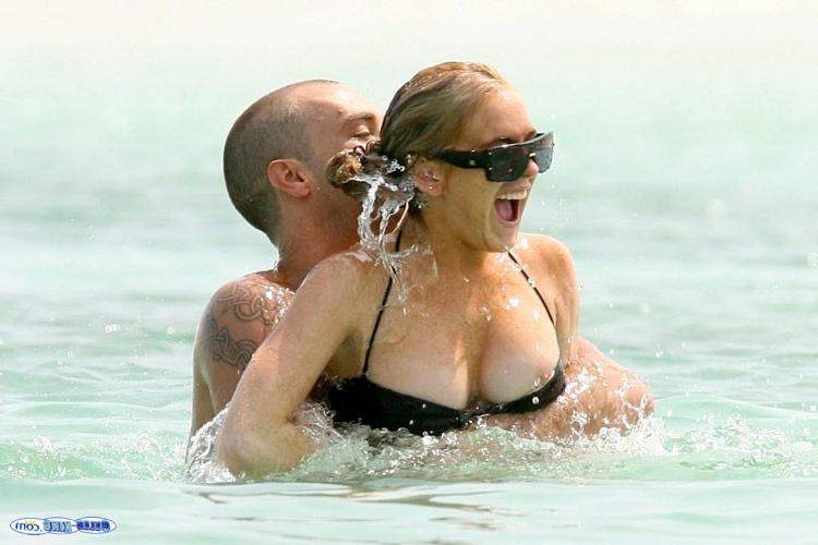 16P Lindsay Lohan show tits in seethru and nipple slip