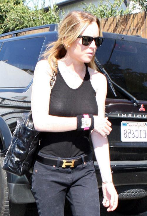 16P Lindsay Lohan show her tits in see thru and nipple