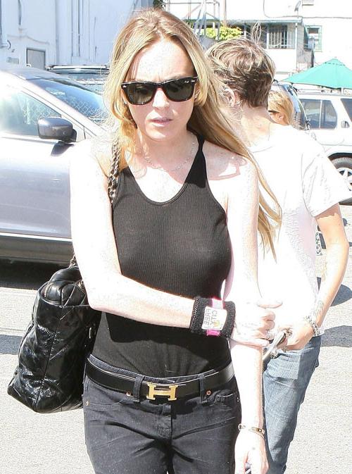 16P Lindsay Lohan show her tits in see thru and nipple