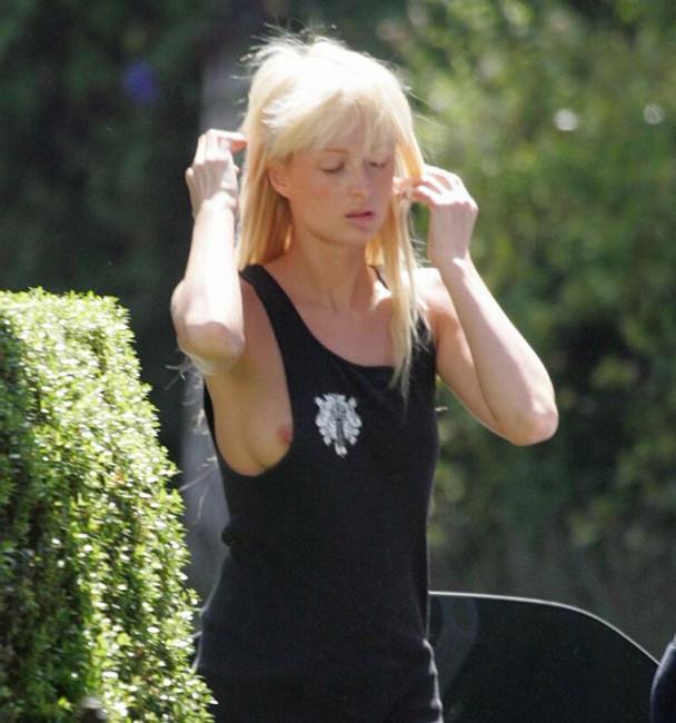 15P Celeb Paris Hilton nude boobs nice nipple slip in public
