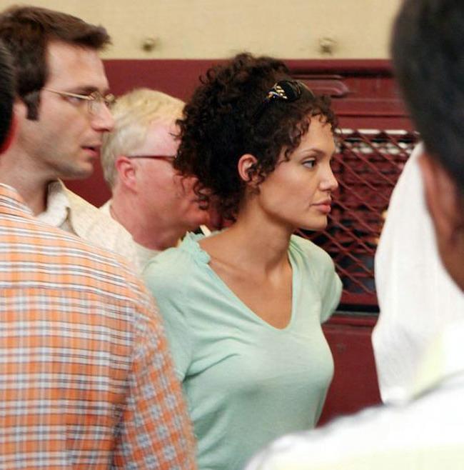 15P Celeb Angelina Jolie hot nipple slip in public