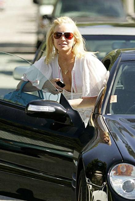 15P Celeb Lindsay Lohan nipple slip and nude ass