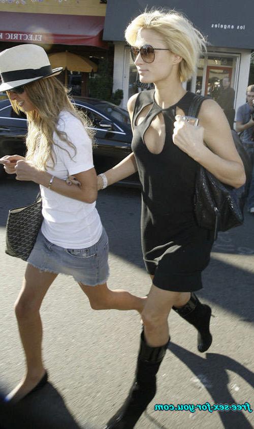 16P Paris Hilton showing her tits and nipple slip paparazzi pics