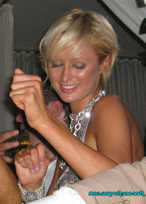 16P Paris Hilton showing great cleavage and dancing with her sister