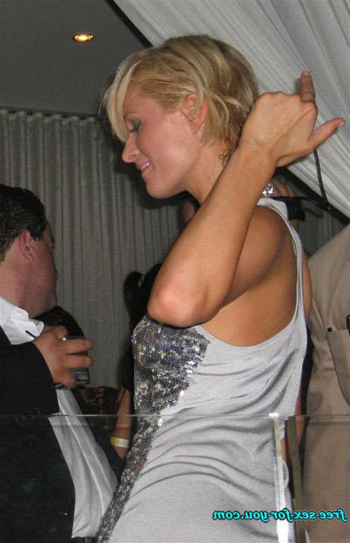16P Paris Hilton showing great cleavage and dancing with her sister