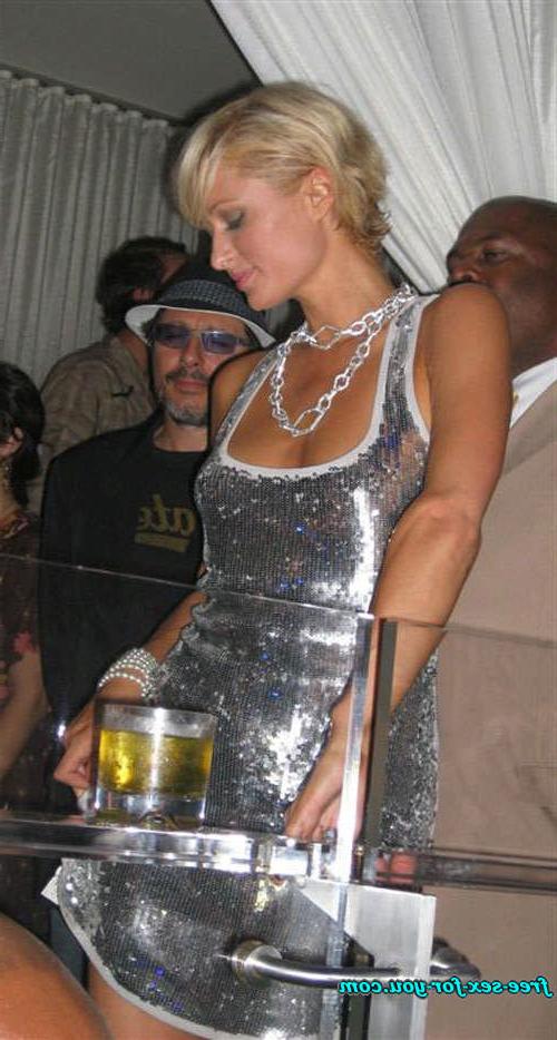 16P Paris Hilton showing great cleavage and dancing with her sister