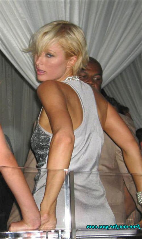16P Paris Hilton showing great cleavage and dancing with her sister