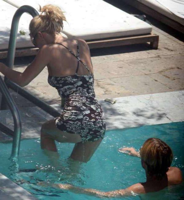 16P Jessica Simpson posing in bikini in pool and nipple slip pics