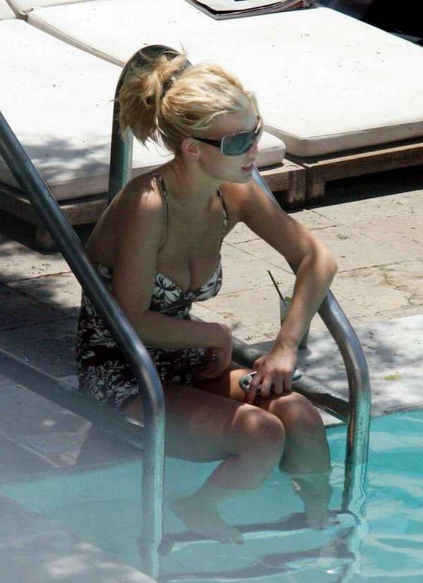 16P Jessica Simpson posing in bikini in pool and nipple slip pics