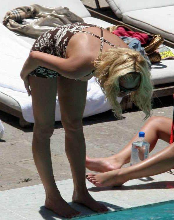 16P Jessica Simpson posing in bikini in pool and nipple slip pics