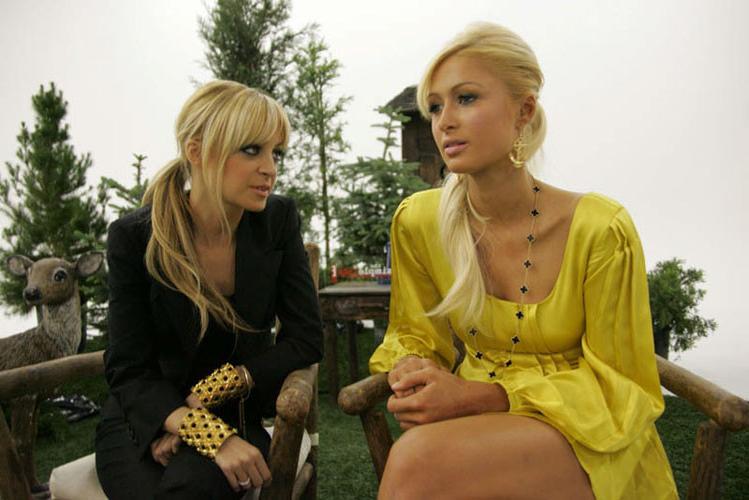 16P Paris Hilton nipple slip and posing very sexy in lingerie
