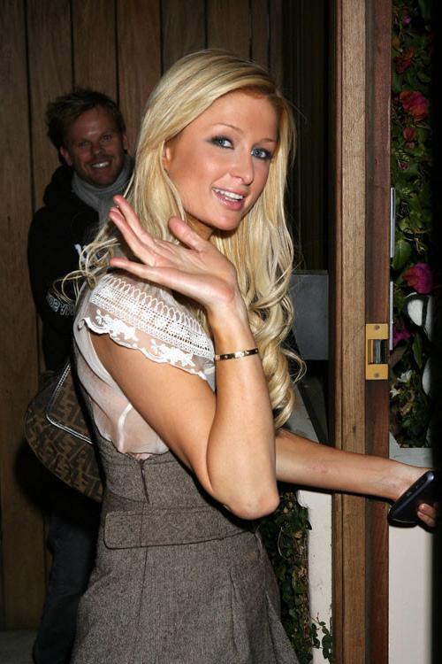 16P Paris Hilton showing pussy and nipple slip paparazzi photos