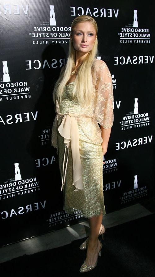16P Paris Hilton pussy slip paparazzi pictures and sexy posing