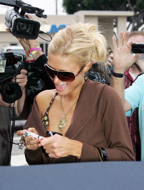 16P Paris Hilton upskirt and nipple slip paparazzi pictures