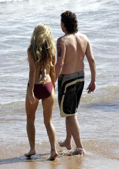 16P Denise Richards pussy slip and red bikini paparazzi pictures