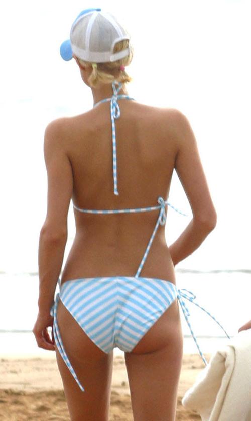 16P Paris Hilton nipple slip and posing in stockings