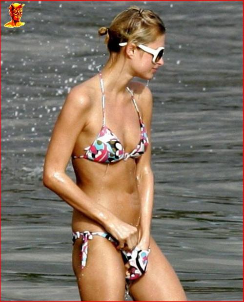 16P Paris Hilton nipple slip and posing in stockings