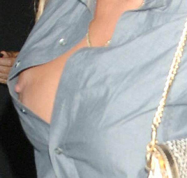 16P Pamela Anderson exposed tits, see thru and nipple slip pictures