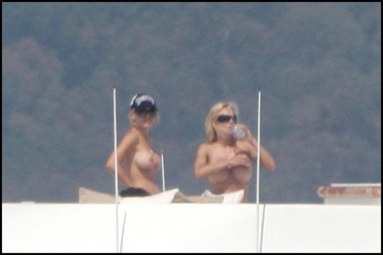 16P Pamela Anderson exposed tits, see thru and nipple slip pictures