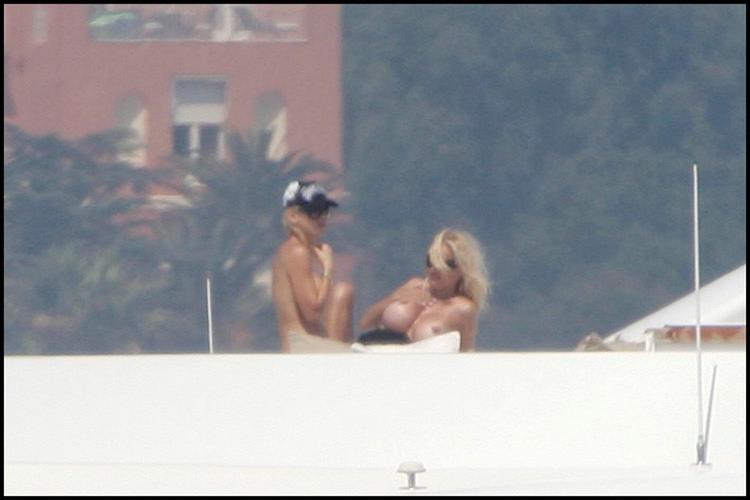 16P Pamela Anderson exposed tits, see thru and nipple slip pictures