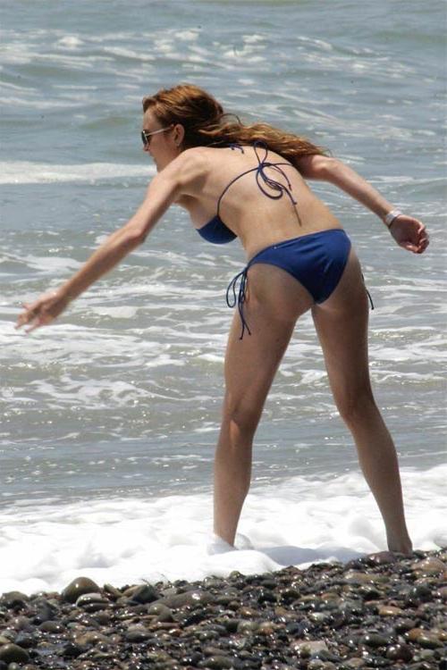 16P Lindsay Lohan in stockings and nipple slip paparazzi pictures