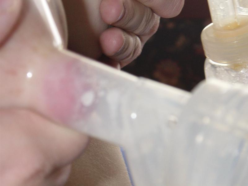 15P Lactating babe milking tits