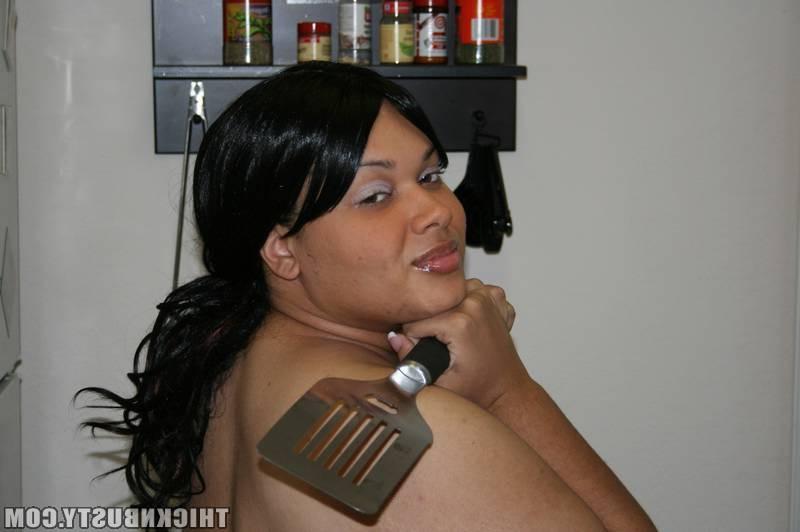 15P Busty bbw showing off her curves in the kitchen