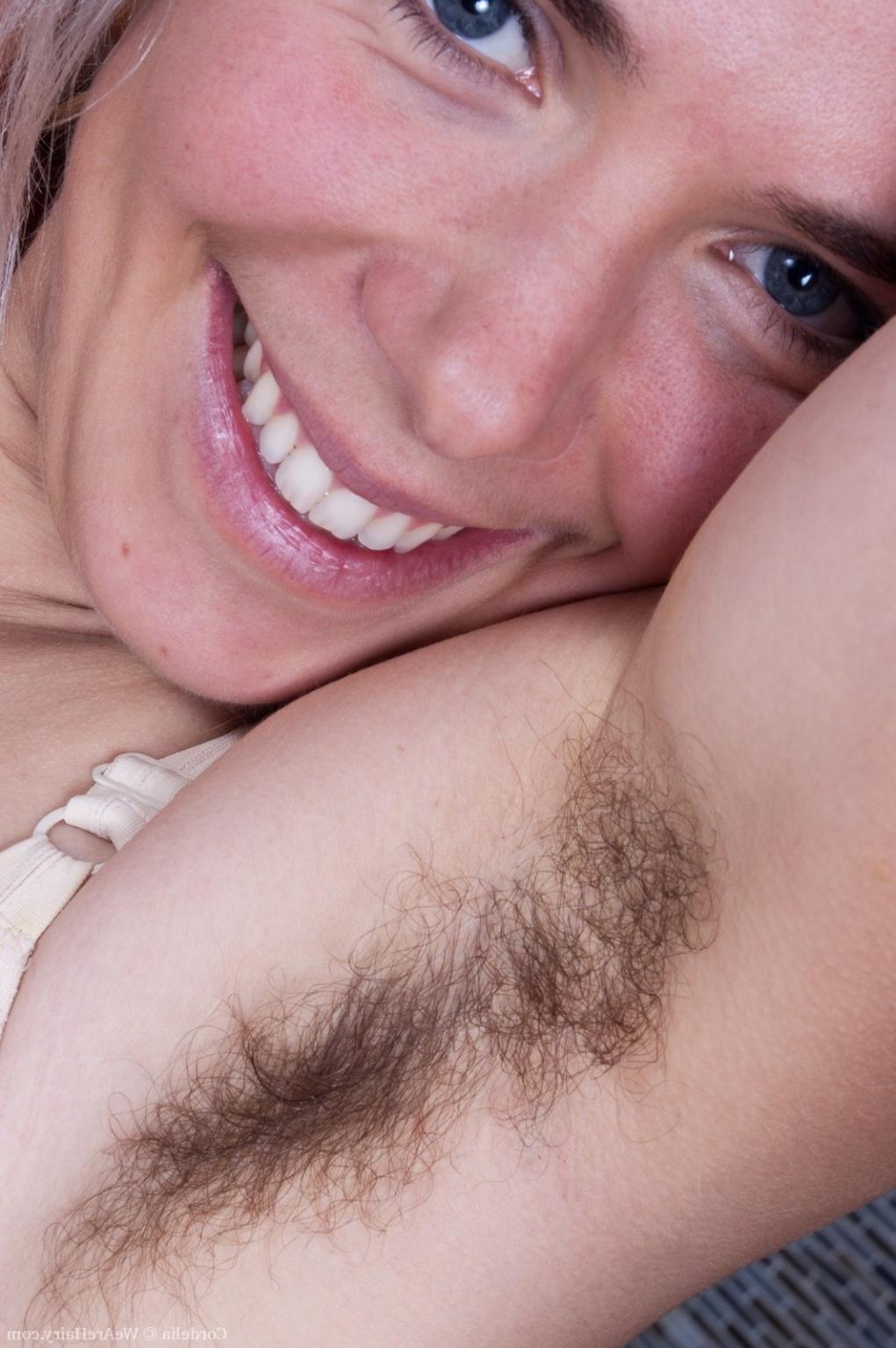 16P Hairy woman Cordelia strips in the kitchen