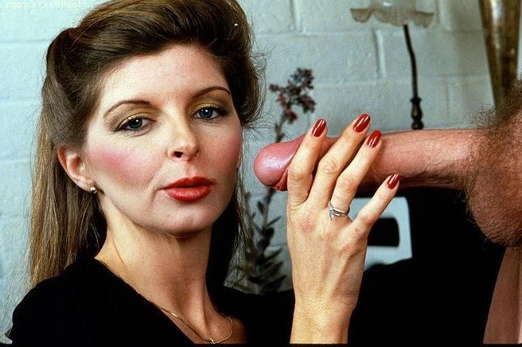 17P Babe tries to get a grip on big John Holmes