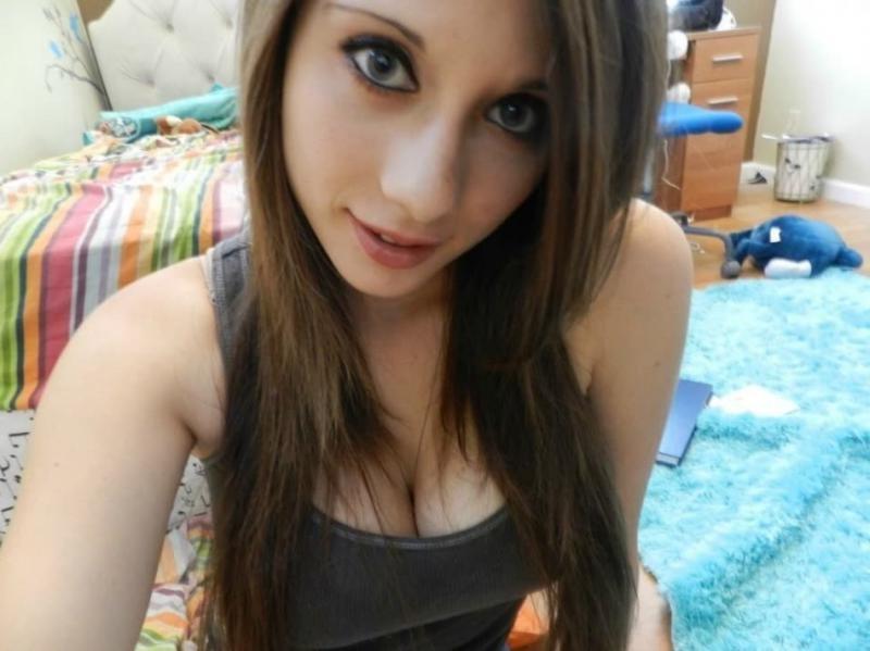 10P Naughty babe shows off her huge knockers and wet pussy